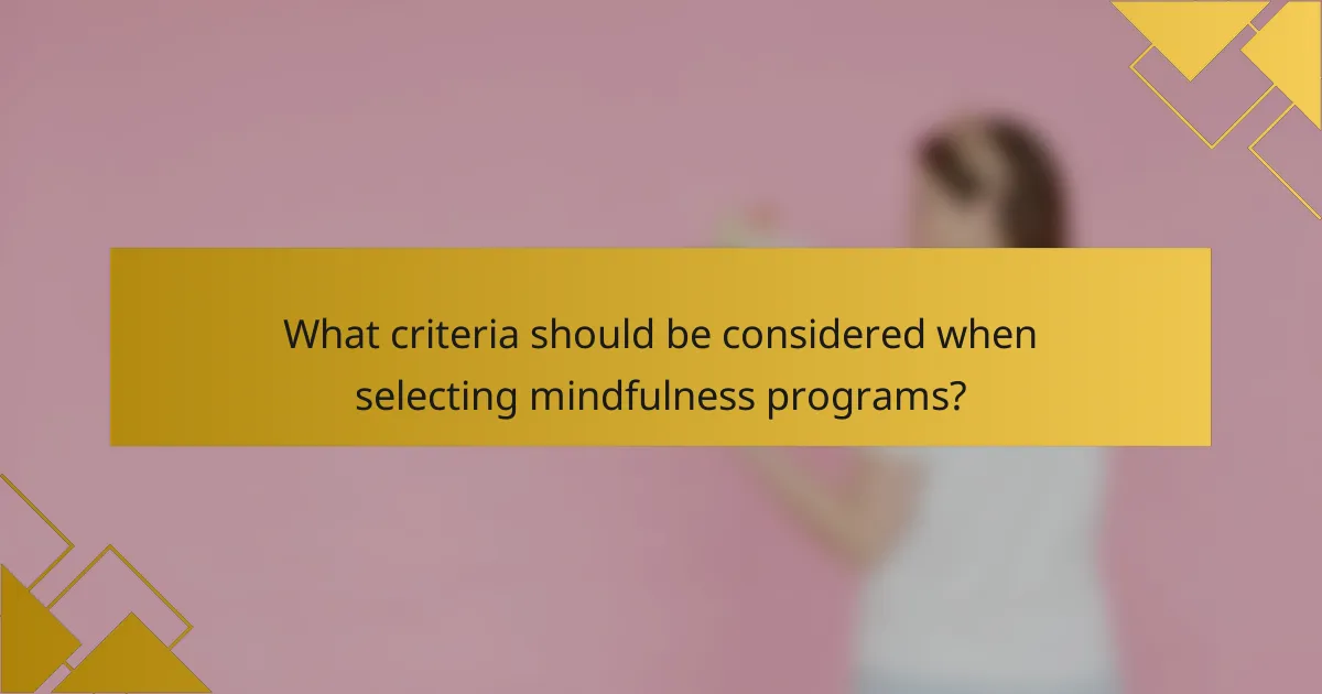 What criteria should be considered when selecting mindfulness programs?